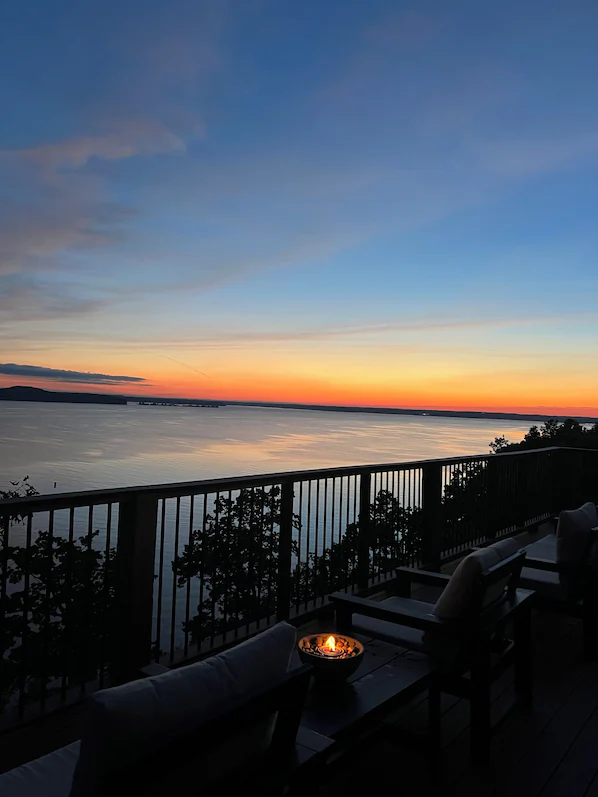 Deck and sunset view at a Kentucky Lake vacation home near Dover
